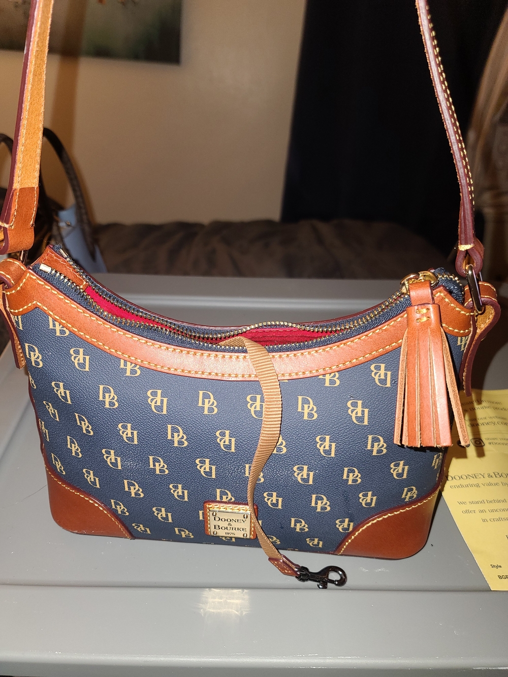 Dooney & Bourke Navy Logo Shoulder Bag with Brown Trim and Tassel